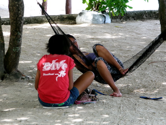 life is a bach: locals relaxing at Pangsama Beach