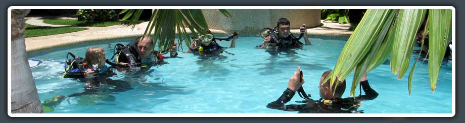 dive students with their instructor at one of our affiiliated dive shops in moalboal
